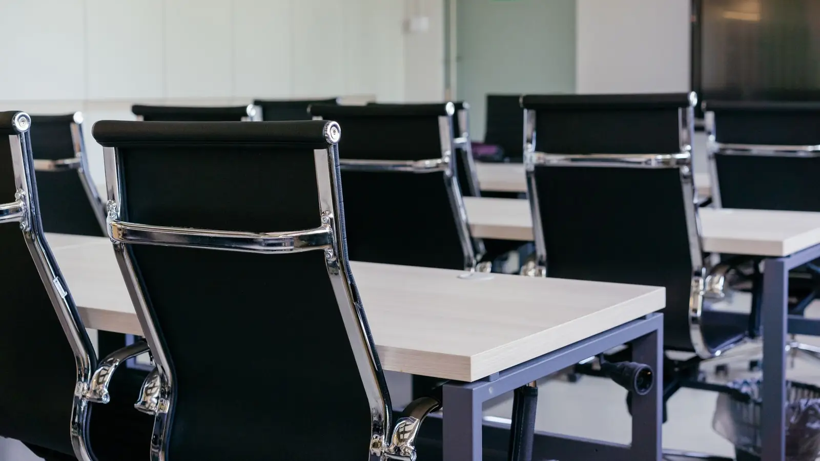 Meeting room with chairs around a table